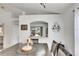 Bright dining room with pass-through to kitchen and view to backyard at 410 Pine Pointe Ct, Seffner, FL 33584