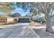 One story house, gray garage, driveway, and front yard landscaping at 410 Pine Pointe Ct, Seffner, FL 33584
