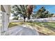 Spacious fenced backyard with concrete patio, perfect for outdoor gatherings and relaxation at 4317 Knollcrest Ct, Spring Hill, FL 34609
