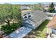 Well-maintained single-story home featuring a two-car garage, manicured lawn, and attractive landscaping at 4317 Knollcrest Ct, Spring Hill, FL 34609