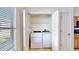Conveniently located laundry area with a washer and dryer at 4317 Knollcrest Ct, Spring Hill, FL 34609