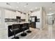 Modern kitchen island with seating and pendant lighting at 4909 4Th N Ave, St Petersburg, FL 33710