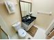 Bathroom with vanity, toilet, and shower/tub combo at 4950 Gulf Blvd # 401, St Pete Beach, FL 33706