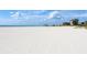 Scenic beach view with white sand and blue water at 4950 Gulf Blvd # 401, St Pete Beach, FL 33706