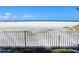 Stunning beach view from private balcony, featuring white sand and ocean at 4950 Gulf Blvd # 401, St Pete Beach, FL 33706