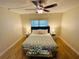 Spacious bedroom with king bed and hardwood floors at 4950 Gulf Blvd # 401, St Pete Beach, FL 33706