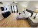 King-size bed, hardwood floors, and plenty of light at 4950 Gulf Blvd # 401, St Pete Beach, FL 33706