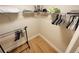 Walk-in closet with shelving and hanging rods at 4950 Gulf Blvd # 401, St Pete Beach, FL 33706