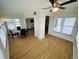Bright dining area with glass top table and dark chairs at 4950 Gulf Blvd # 401, St Pete Beach, FL 33706