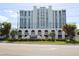 Elegant high-rise building with lush landscaping at 4950 Gulf Blvd # 401, St Pete Beach, FL 33706