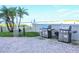 Outdoor grilling area with ocean views at 4950 Gulf Blvd # 401, St Pete Beach, FL 33706