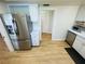 Kitchen with stainless steel appliances and hardwood floors at 4950 Gulf Blvd # 401, St Pete Beach, FL 33706
