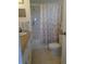 Bathroom with shower/tub combo, toilet, and vanity at 5335 Fairfield S Ave # 78, Gulfport, FL 33707