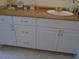 Bathroom vanity with drawers and a brown countertop at 5335 Fairfield S Ave # 78, Gulfport, FL 33707