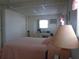 Main bedroom with a double bed and ceiling fan at 5335 Fairfield S Ave # 78, Gulfport, FL 33707