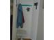 Small entryway with coat rack, small table, and beach decorations at 5335 Fairfield S Ave # 78, Gulfport, FL 33707