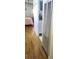 Hallway with wood flooring and access to other rooms at 5335 Fairfield S Ave # 78, Gulfport, FL 33707