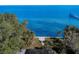 Spacious backyard with a screened-in patio overlooking the water at 5926 Bahama Shores S Dr, St Petersburg, FL 33705