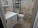 Clean bathroom with a shower/tub combo and updated vanity at 6145 55Th N Ave, St Petersburg, FL 33709