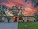 Charming ranch home with landscaped yard and lovely sunset views at 6145 55Th N Ave, St Petersburg, FL 33709