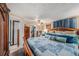 Main bedroom with a comfortable bed and lots of storage at 6145 55Th N Ave, St Petersburg, FL 33709