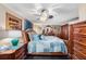 Main bedroom with a comfortable bed and lots of storage at 6145 55Th N Ave, St Petersburg, FL 33709