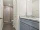 Modern bathroom with granite countertop and walk-in shower at 806 E Laura St, Plant City, FL 33563