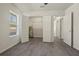 Bright bedroom with spacious closet and laminate flooring at 806 E Laura St, Plant City, FL 33563