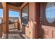 Front porch with wooden deck and entrance to home at 806 E Laura St, Plant City, FL 33563