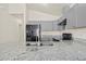 Modern kitchen with granite countertops and stainless steel appliances at 806 E Laura St, Plant City, FL 33563