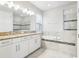 Bathroom with double vanity, soaking tub, and shower at 8836 Citrus Palm Dr, Tampa, FL 33626