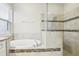 Bathroom with a large walk-in shower and garden tub at 8836 Citrus Palm Dr, Tampa, FL 33626