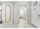Bright entryway with tile floors and access to laundry room at 8836 Citrus Palm Dr, Tampa, FL 33626