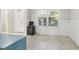 Foyer with tile floors and white wainscoting at 8836 Citrus Palm Dr, Tampa, FL 33626