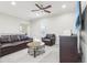 Relaxing Gathering room featuring comfortable seating and a ceiling fan at 8836 Citrus Palm Dr, Tampa, FL 33626