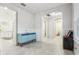 Bright hallway with blue cabinet and kitchen view at 8836 Citrus Palm Dr, Tampa, FL 33626