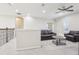Bright loft area with two leather couches and a coffee table at 8836 Citrus Palm Dr, Tampa, FL 33626