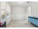 Home office with blue cabinet and window at 8836 Citrus Palm Dr, Tampa, FL 33626