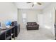 Functional home office with a desk and seating area at 8836 Citrus Palm Dr, Tampa, FL 33626