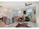 Upstairs loft area with neutral walls and a ceiling fan at 1106 Rose Blossom Ct, Tampa, FL 33613