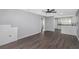 Spacious living room with gray walls and dark flooring at 1202 S Walker St, Plant City, FL 33563