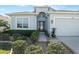 Charming one-story home with landscaped front yard and two-car garage at 12425 Glenridge Ln, Parrish, FL 34219