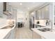 Spacious kitchen with stainless steel appliances and island at 12425 Glenridge Ln, Parrish, FL 34219