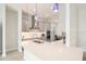Modern kitchen with stainless steel appliances and breakfast bar at 12425 Glenridge Ln, Parrish, FL 34219