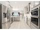 Modern kitchen with stainless steel appliances at 12425 Glenridge Ln, Parrish, FL 34219