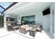 Outdoor kitchen and patio furniture with a covered lanai at 12425 Glenridge Ln, Parrish, FL 34219