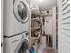 Convenient laundry area with washer, dryer, and extra storage shelves at 1330 Snell Isle Ne Blvd # 4, St Petersburg, FL 33704