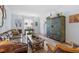 Spacious living room featuring a leather sofa and rustic wooden coffee table at 1330 Snell Isle Ne Blvd # 4, St Petersburg, FL 33704
