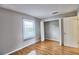 Spacious bedroom with wood floors and a closet at 13760 Orange Sunset Dr # 201, Tampa, FL 33618