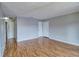 Living room with wood-look floors and an interior view at 13760 Orange Sunset Dr # 201, Tampa, FL 33618